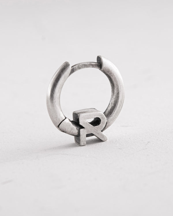 Boucle d'oreille unique en argent REYTEL