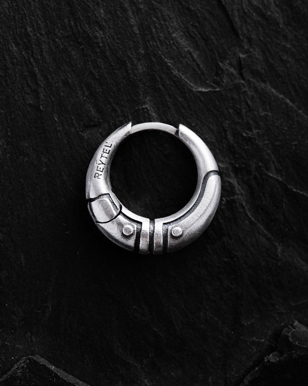 Silver monoearring AXE