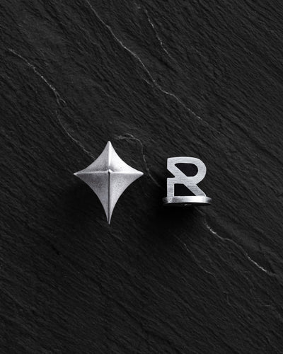 Boucle d'oreille unique en argent SPIRE