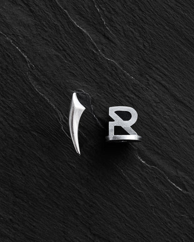 Boucle d'oreille unique en argent FANG