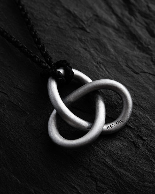 Silver pendant TRINITY (on a string)
