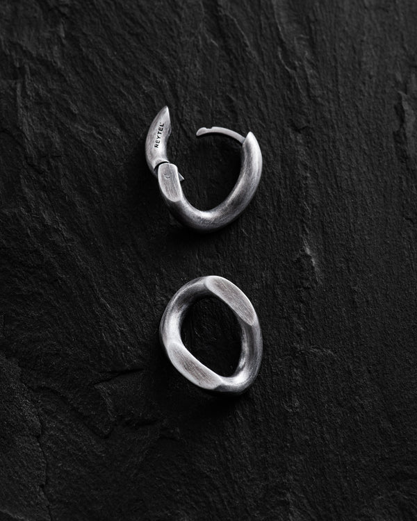 Silver monoearring DUAL