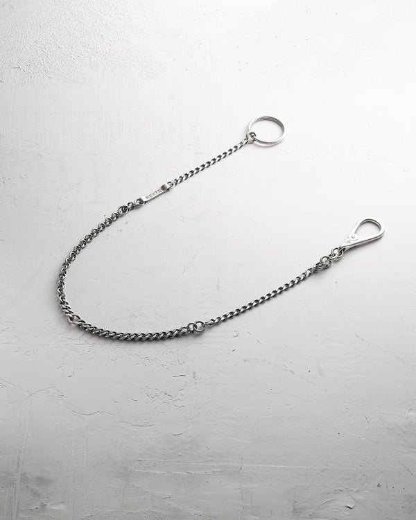 Silver key chain UNBOUND